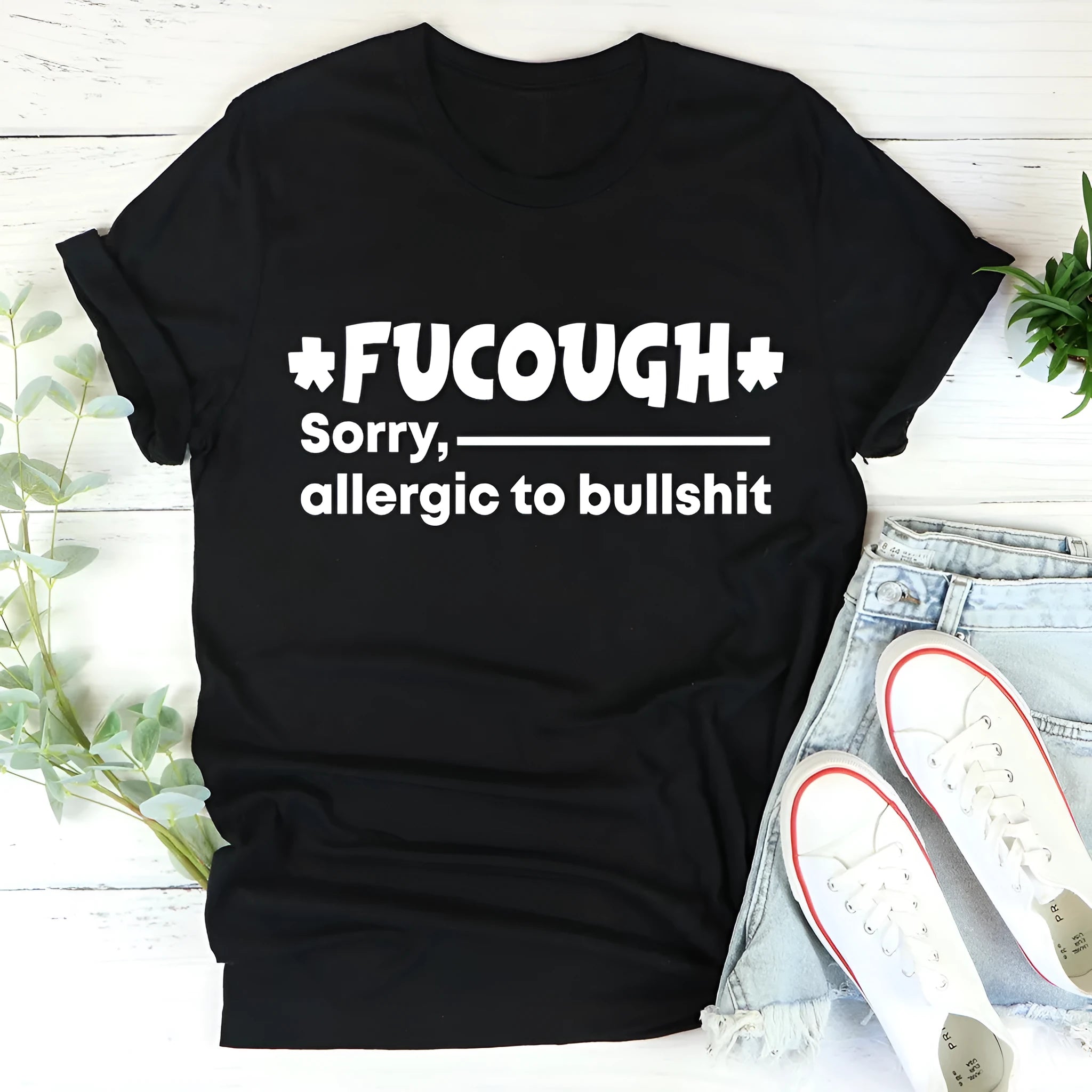 Black cotton short sleeve t-shirt with round neck and loose fit design