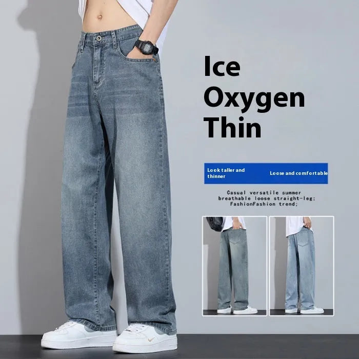 Light blue ice silk straight-leg wide trousers laid flat, showing zip fly and relaxed leg cut.