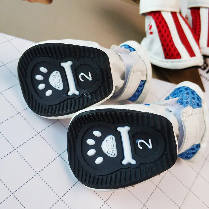 Set of four pairs of blue cloth dog sneakers with a side zipper for small breeds.