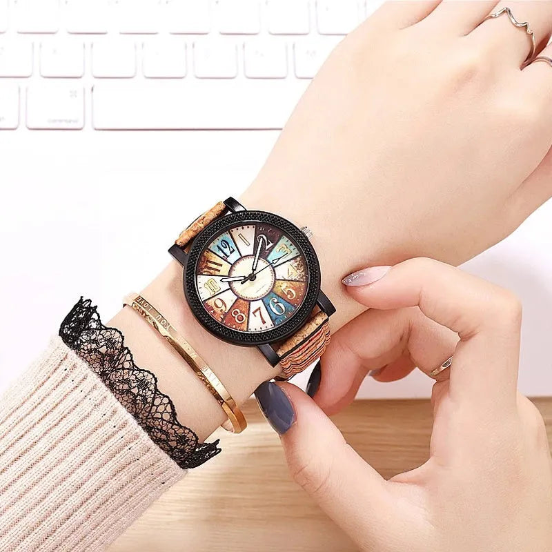 Women's vintage style quartz watch with brown leather strap and 37mm round silver dial