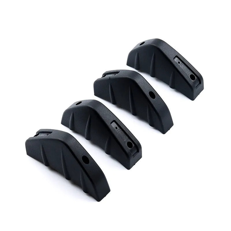 Set of four black ABS plastic triangle rear spoilers for car bumper, measuring 15cm wide, with screws and adhesive tape.