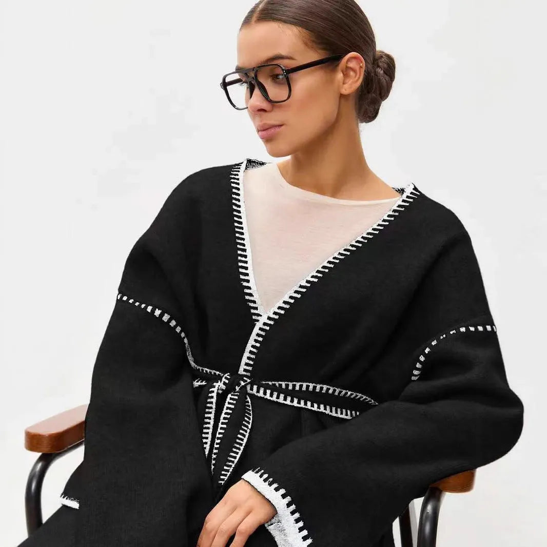 Loose mid-length knitted cardigan with lace-up front closure in cotton imitation cashmere fabric