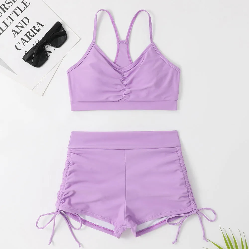 Women's high waist split swimsuit bikini in purple and black colours with spandex and nylon lining