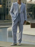 Women's blue and white striped polyester suit set with blazer, trousers and shirt