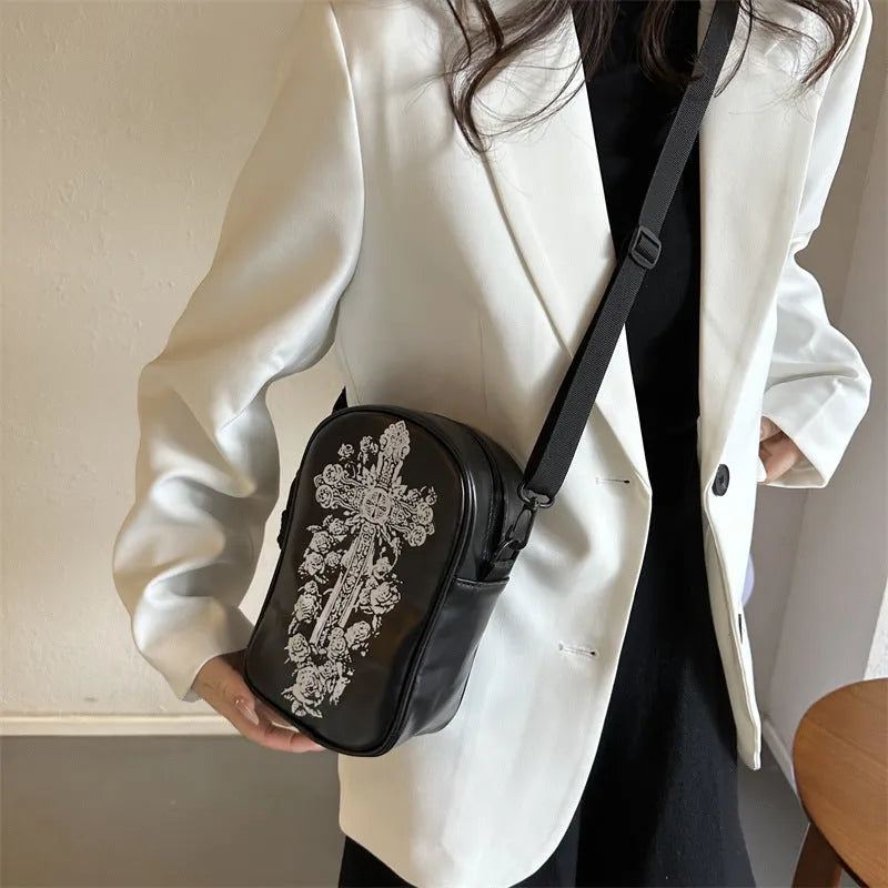 Halloween graffiti print crossbody bag showing pumpkin, ghost and bat designs in medium 14x23x9.5cm size