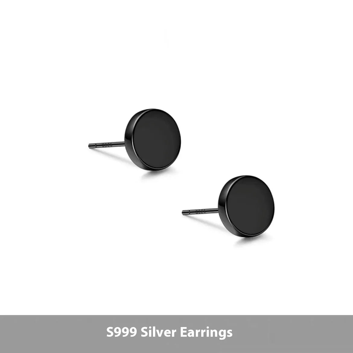A pair of simple, round, flat-fronted S999 sterling silver ear bone studs on a plain background.