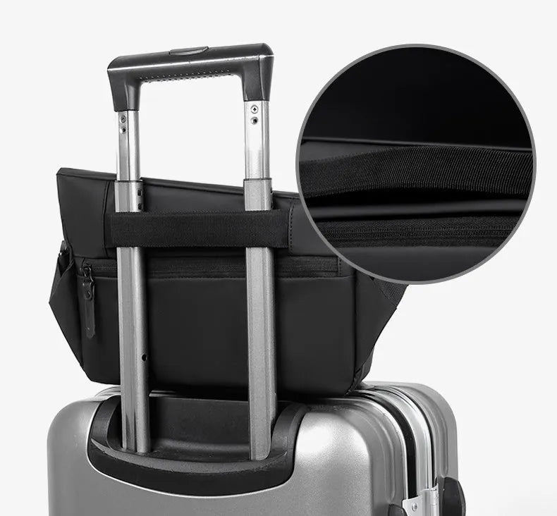 Men's grey crossbody bag showing internal phone pocket and document compartment with shoulder strap