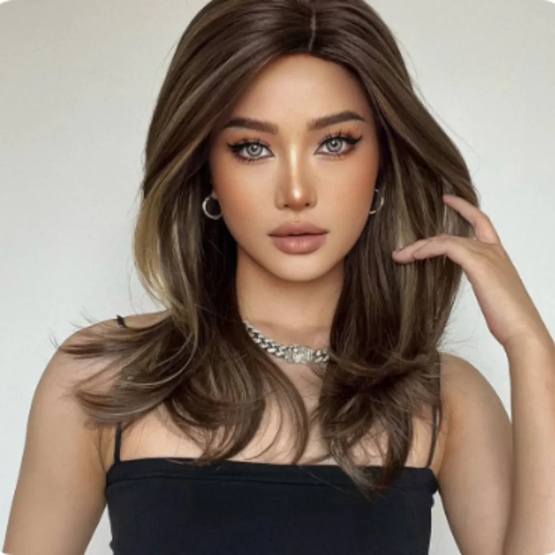 Mid-length platinum gradient colour wig with curly hair and fringe on model