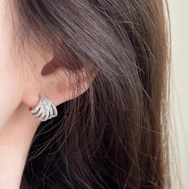 Women's geometric line design earrings with zircon detailing and platinum electroplated finish