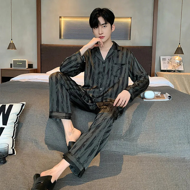 Black striped ice silk men's pajama set with long sleeve V-neck top and thin trousers.