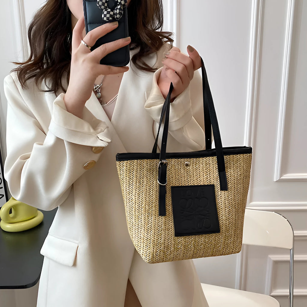 Straw woven women's shoulder bag with three-dimensional pockets in black colour option