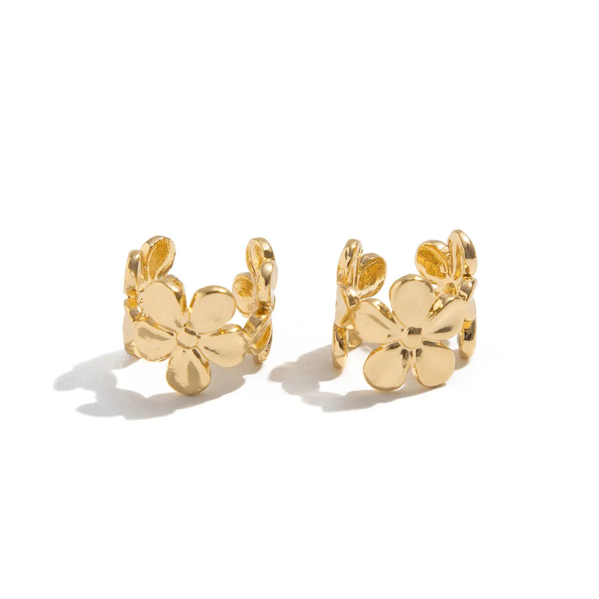 Gold starfish and scallop shell drop earrings with conch details for women