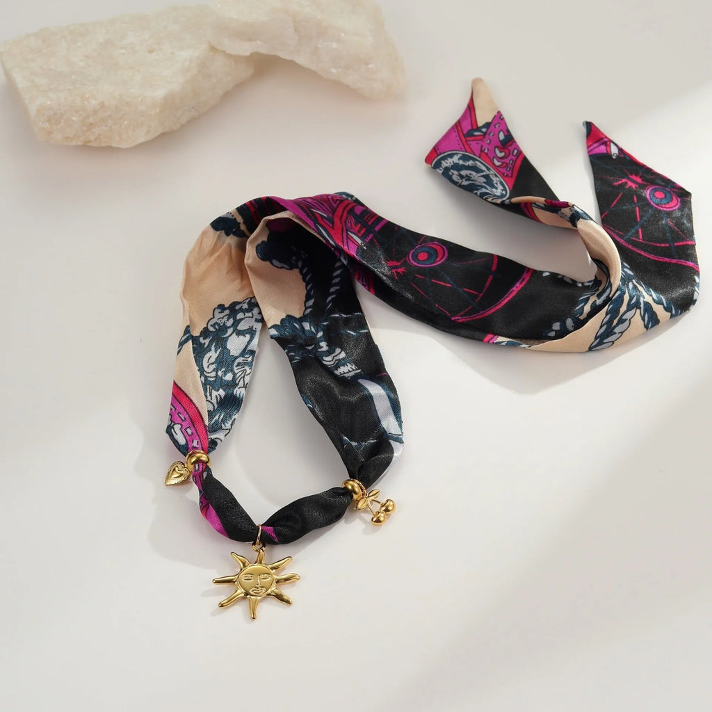 Geometric sun pendant necklace or bracelet in stainless steel with 18K electroplating for autumn winter fashion