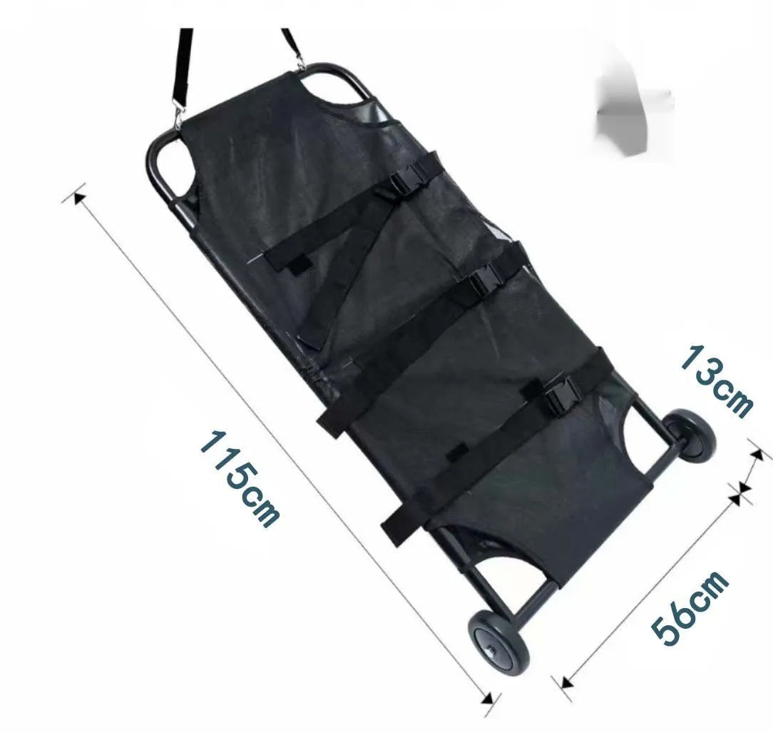 Large black aluminium alloy foldable pet stretcher unfolded on the ground for dog emergency transport.