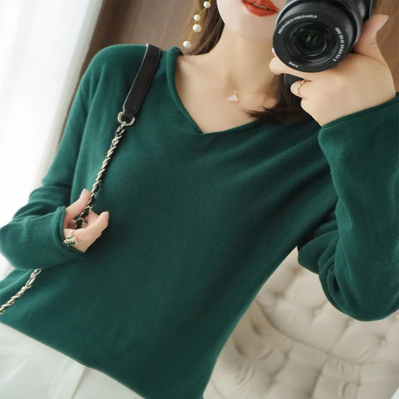 Women's long sleeve V-neck knitwear pullover top in a choice of ten colours on a hanger.