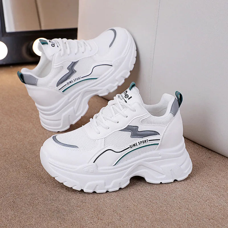 White women's dad shoes with cross shoulder straps, lace-up front, and a breathable mesh upper.