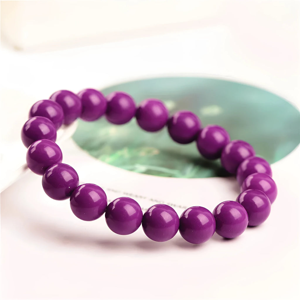 Jiuya purple crystal bracelet with polished beads showing three distinct size options