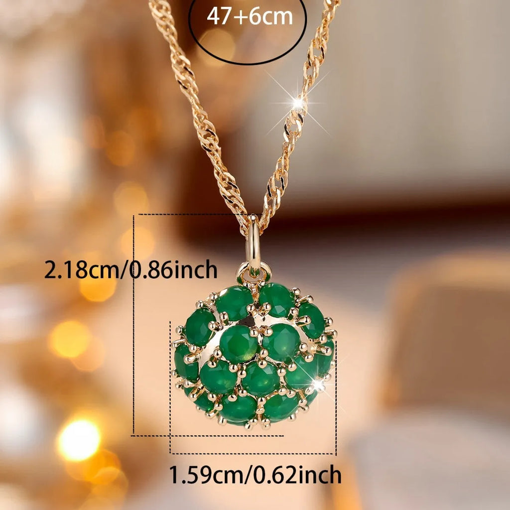 Round emerald and diamond necklace with champagne gold finish and adjustable chain
