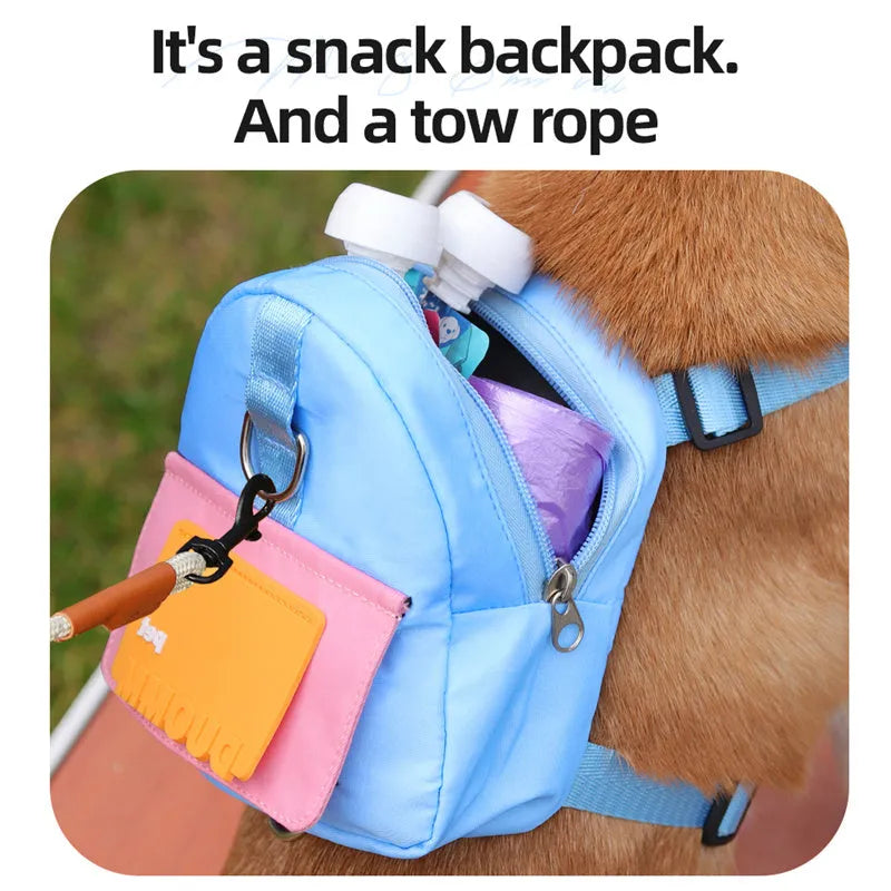 Blue adjustable dog harness backpack with storage compartment and tow rope shown on a medium-sized dog.