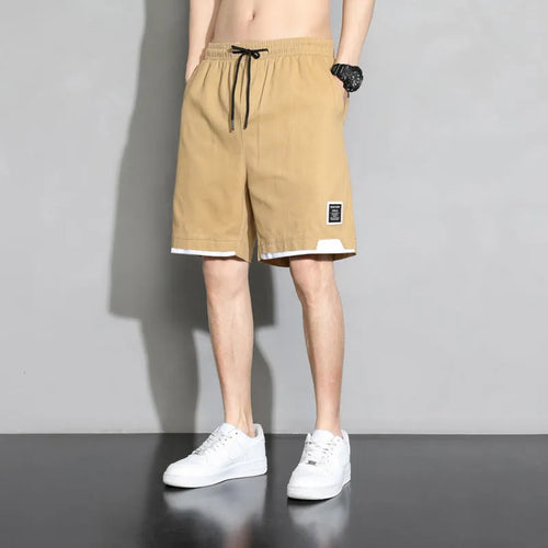 Boys' cotton summer shorts in sporty style available in black, khaki, and white colours