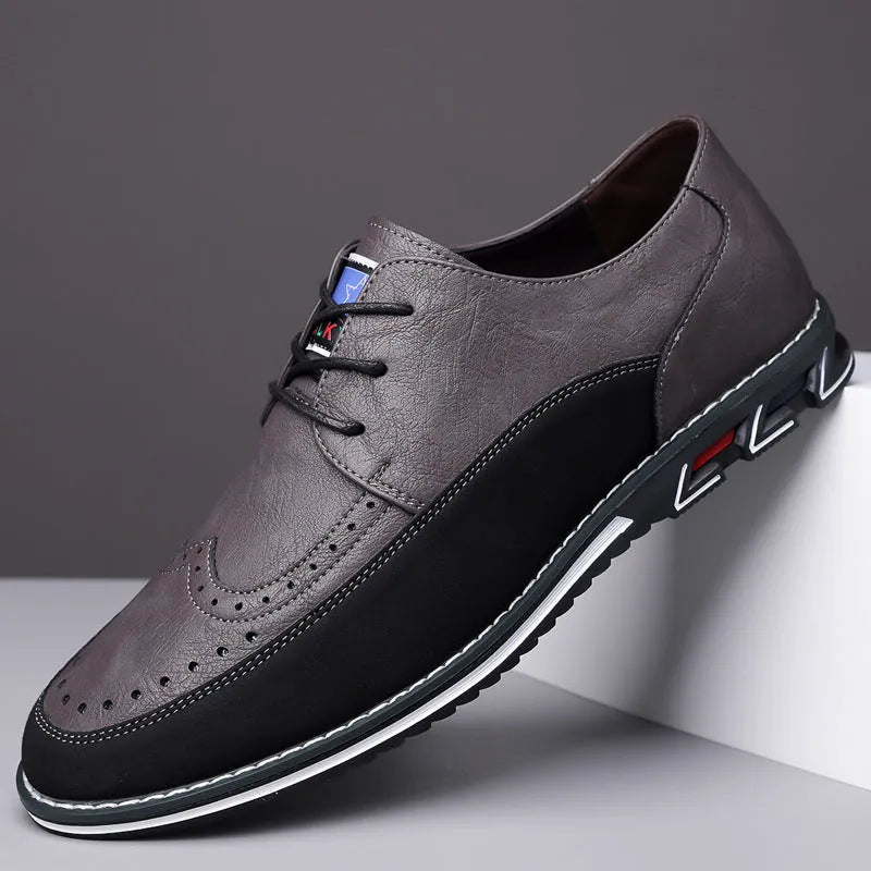 Men's casual leather shoes in black with rubber sole, leather toe cap, and stitching detail.