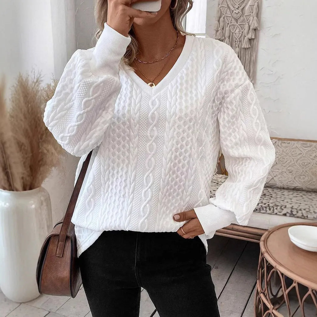 Milky white loose fit men's long sleeve T-shirt with a raised 3D pattern, casual style.