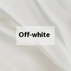 Solid colour double-sided silk duvet cover in bright brown, showing smooth texture and neat corner.