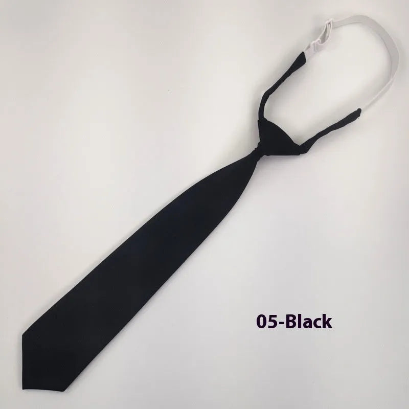 Men's navy blue cotton bow tie with arrow-style design on a white background.