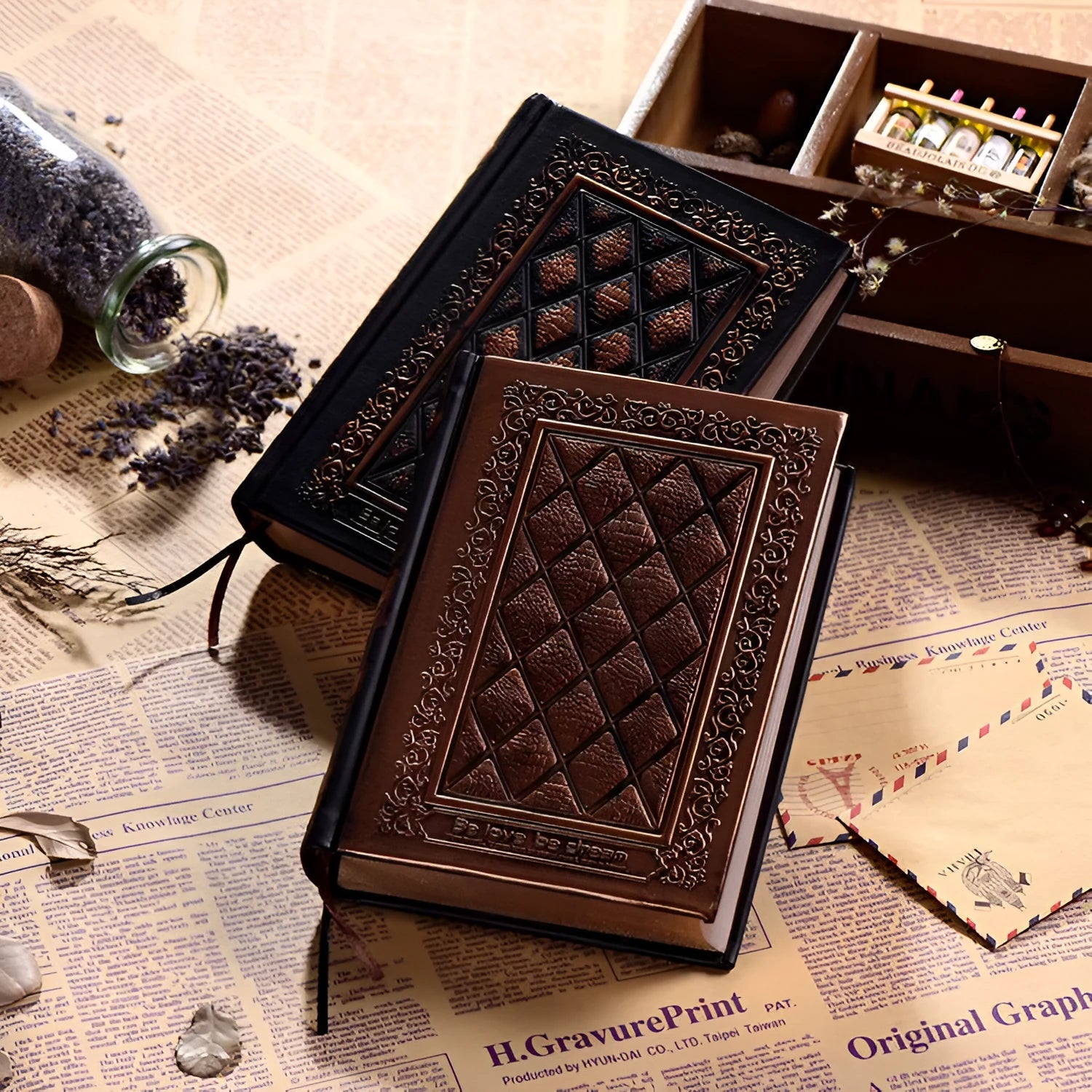 A5 embossed faux leather notebook with a thick cover in bronze or black gold colour.