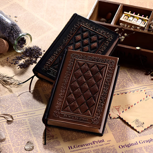 A5 embossed faux leather notebook with a thick cover in bronze or black gold colour.