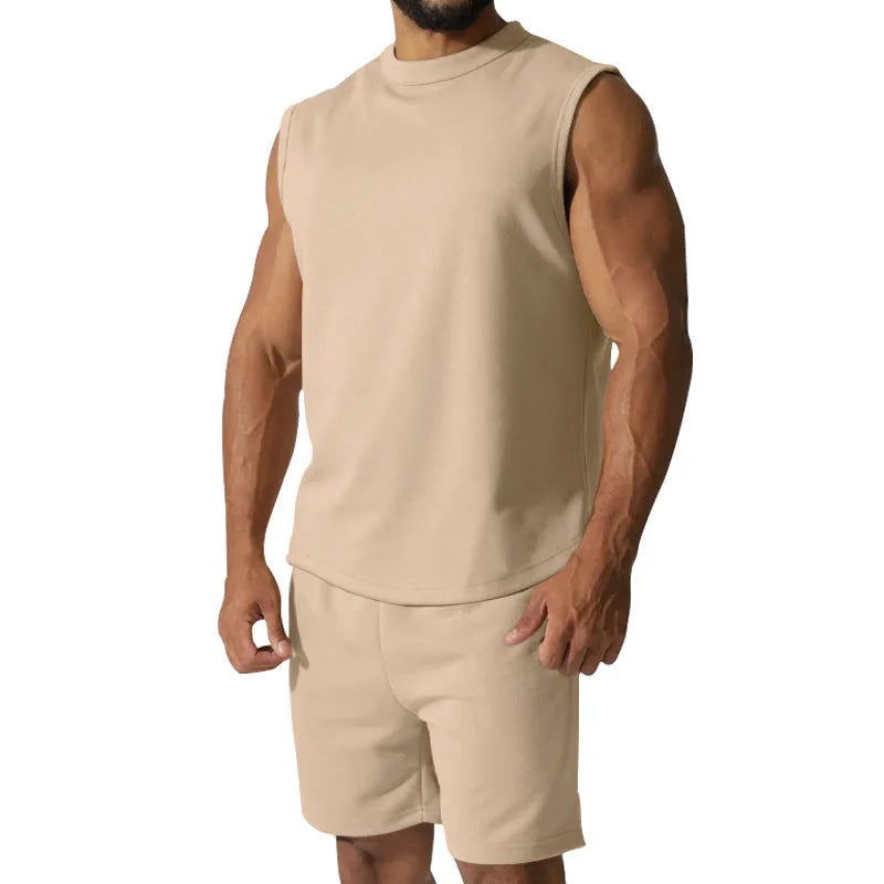 Men's sleeveless cotton blend sports top and matching shorts in a solid colour