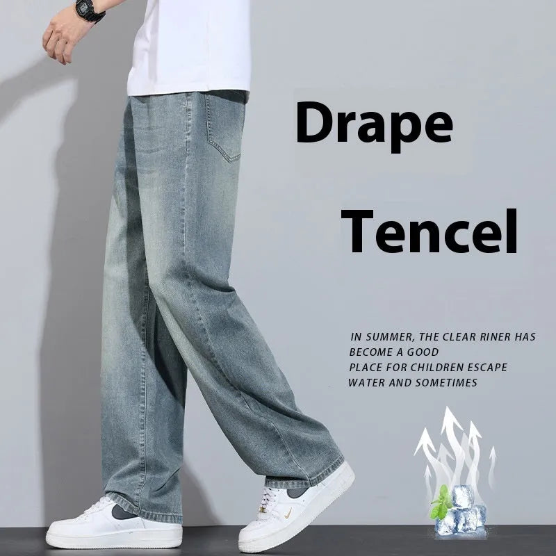 Light blue ice silk straight-leg wide trousers laid flat, showing zip fly and relaxed leg cut.