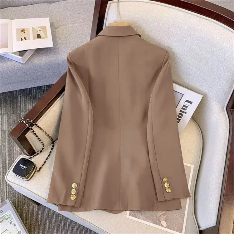 Women's loose fit polyester blouse in black showing slimming silhouette and regular sleeves