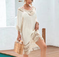 Apricot coloured women's crocheted knitted patchwork beach dress with mid-length skirt and half sleeves