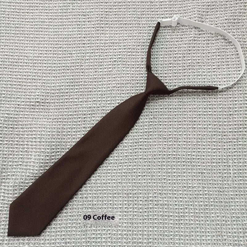 Men's navy blue cotton bow tie with arrow-style design on a white background.