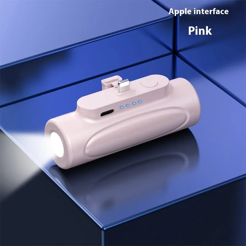 Black creative power bank with LED flashlight showing Type-C charging port and compact 83mm size