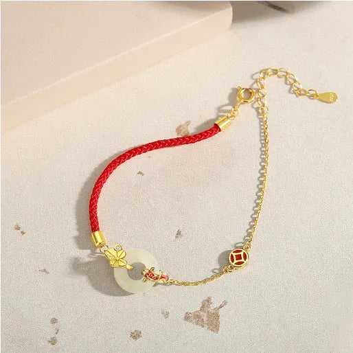 Koi peace buckle hetian jade red rope bracelet in 925 silver with gold electroplated finish