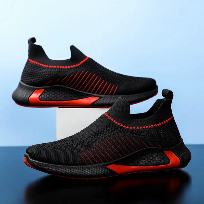 Men's black and white striped mesh sock shoes with lace-up front on a white background
