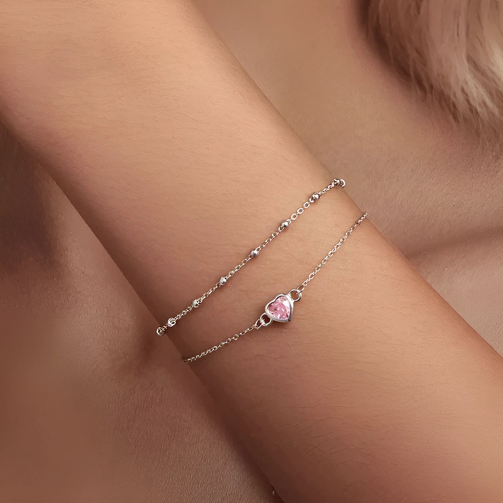 Women's sterling silver heart bracelet with adjustable chain and 6mm pendant