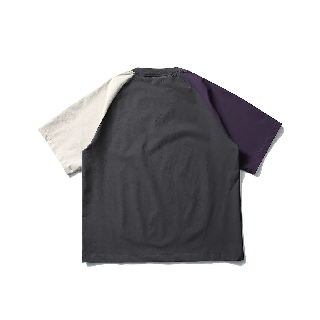 Dark grey men's loose fit t-shirt with contrast colour raglan short sleeves.