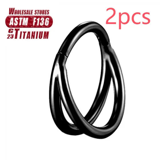 Titanium alloy fork nose ring in silver colour on a plain background, showing its shape and size.