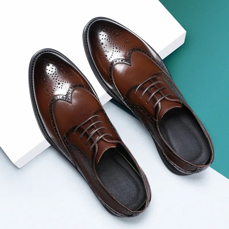 Men's black brogue leather shoes with traditional perforated detailing and lace-up design