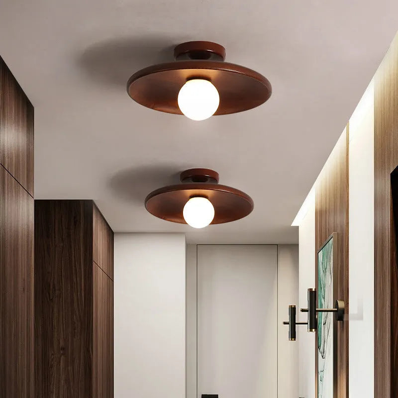 Modern solid wood and glass ceiling lamp in walnut colour showing three size options.