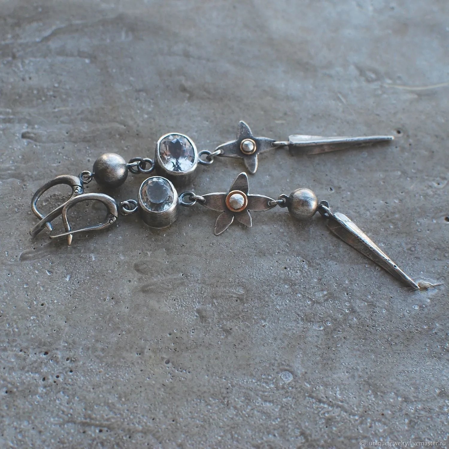 Geometric antique silver pendant earrings with XINGX design and rhinestone detailing