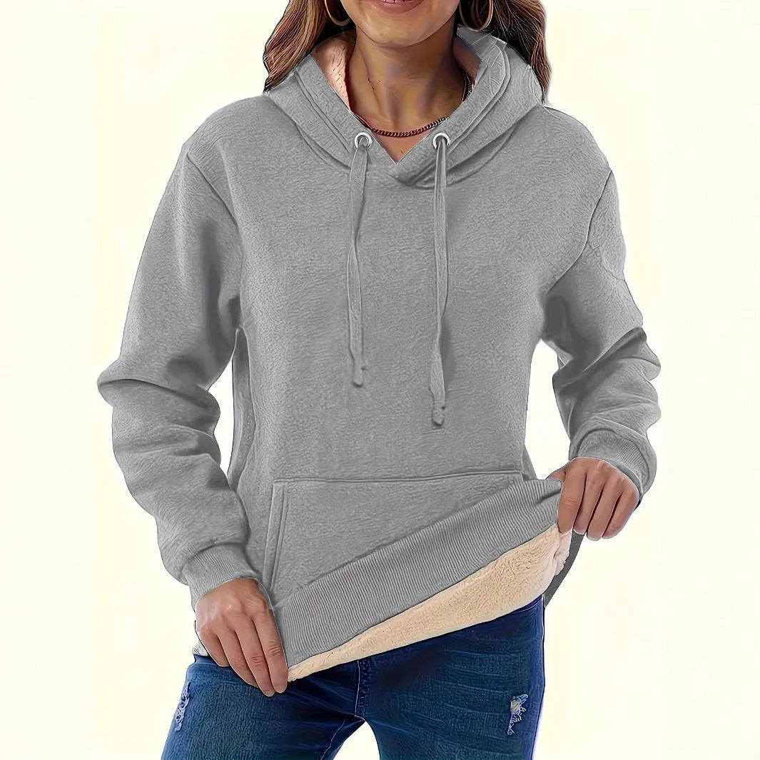 Women's loose fit hooded sweatshirt in thick polyester fabric with side pockets
