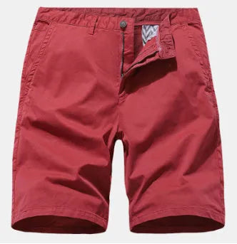 Blue denim men's shorts with printed design, loose fit, and no belt on a mannequin.
