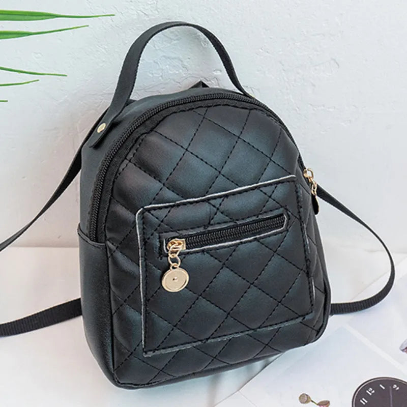 Girls' Korean style embroidered backpack in hard PU material showing vertical square shape and sandwich pocket