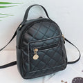 Girls' Korean style embroidered backpack in hard PU material showing vertical square shape and sandwich pocket