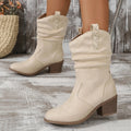 Women's mid-calf suede boots with leather stitching detail and short stout rubber heel