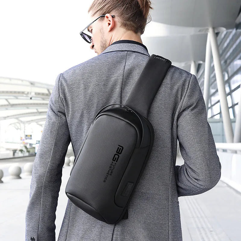 Men's black casual shoulder bag with USB port and Oxford cloth material for business travel.
